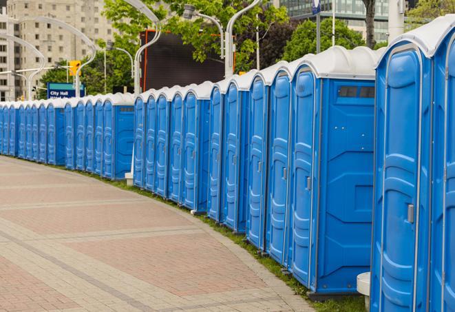 a row of portable restrooms at a fairground, offering visitors a clean and hassle-free experience in melbeta